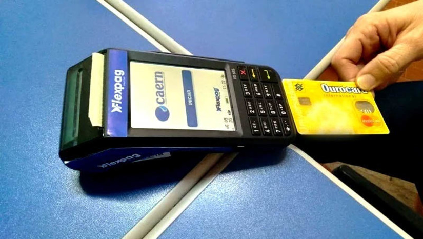 Imagem 1 - Nova campanha de negociação de débitos com a Caern começa no dia 10 de outubro. A campanha terá duração de 30 dias e, além de oferecer descontos de juros e multa, também permite o parcelamento do saldo devedor em até 60 meses, com entrada de 5% do valor do débito. A campanha abrange faturas anteriores a julho de 2022. Caso o cliente decida não fazer o pagamento à vista, o parcelamento em até 60 vezes pode ser feito, desde que o valor da parcela seja de, no mínimo, 50% do valor médio da fatura do imóvel. O parcelamento pode incluir qualquer conta, mas só haverá dispensa de juros e multa para as faturas anteriores a julho. Imagem 1 - Nova campanha de negociação de débitos com a Caern começa no dia 10 de outubro. A campanha terá duração de 30 dias e, além de oferecer descontos de juros e multa, também permite o parcelamento do saldo devedor em até 60 meses, com entrada de 5% do valor do débito. A campanha abrange faturas anteriores a julho de 2022. Caso o cliente decida não fazer o pagamento à vista, o parcelamento em até 60 vezes pode ser feito, desde que o valor da parcela seja de, no mínimo, 50% do valor médio da fatura do imóvel. O parcelamento pode incluir qualquer conta, mas só haverá dispensa de juros e multa para as faturas anteriores a julho.