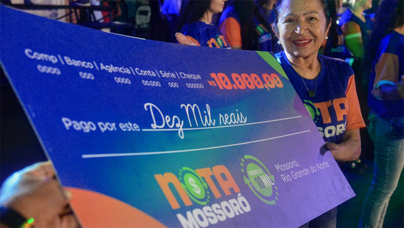 Imagem 1 - Nota Mossoró: entrega de premiação do segundo sorteio de 2024 acontecerá na próxima segunda (15). A solenidade de entrega das premiações está marcada para às 17h, no auditório da Estação das Artes Elizeu Ventania. Cada etapa do programa de incentivo à cidadania fiscal contempla cinco ganhadores. Os prêmios variam de R$ 10 mil a R$ 3,5 mil. O programa de incentivo à emissão de Nota Fiscal Eletrônica de Serviços (NFS-e) distribui R$ 25 mil em prêmios a cada sorteio; veja como se cadastrar para concorrer. Imagem 1 - Nota Mossoró: entrega de premiação do segundo sorteio de 2024 acontecerá na próxima segunda (15). A solenidade de entrega das premiações está marcada para às 17h, no auditório da Estação das Artes Elizeu Ventania. Cada etapa do programa de incentivo à cidadania fiscal contempla cinco ganhadores. Os prêmios variam de R$ 10 mil a R$ 3,5 mil. O programa de incentivo à emissão de Nota Fiscal Eletrônica de Serviços (NFS-e) distribui R$ 25 mil em prêmios a cada sorteio; veja como se cadastrar para concorrer.