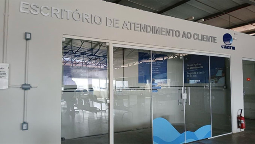 Imagem 1 -  A unidade funcionará no primeiro andar do Estação Shopping, na área da Central do Cidadão, localizada na Avenida Alberto Maranhão, a partir desta terça-feira (04/11). O local dispõe de cinco guichês, oferecendo atendimento de qualidade, com conforto e organização. O horário de funcionamento é das 8h às 17h, sem intervalo para almoço. Na nova agência do Estação Shopping, haverá emissão de senhas e um telão digital para acompanhamento da ordem de atendimento.