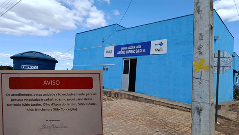   Aviso afixado na unidade informa que os atendimentos são exclusivos para moradores de determinadas comunidades. Ausência do Sítio Chapada e inclusão de localidade pertencente a outro município levantam dúvidas sobre os critérios adotados. Veja o que diz a secretária de saúde Maria Eliza Garcia, que afixou o Comunicado.